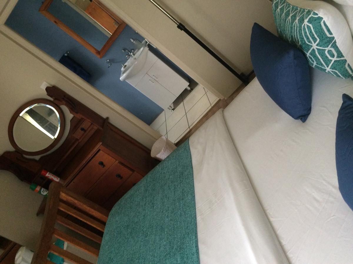 Breeze Inn Guesthouse Kiddʼs Beach Rom bilde